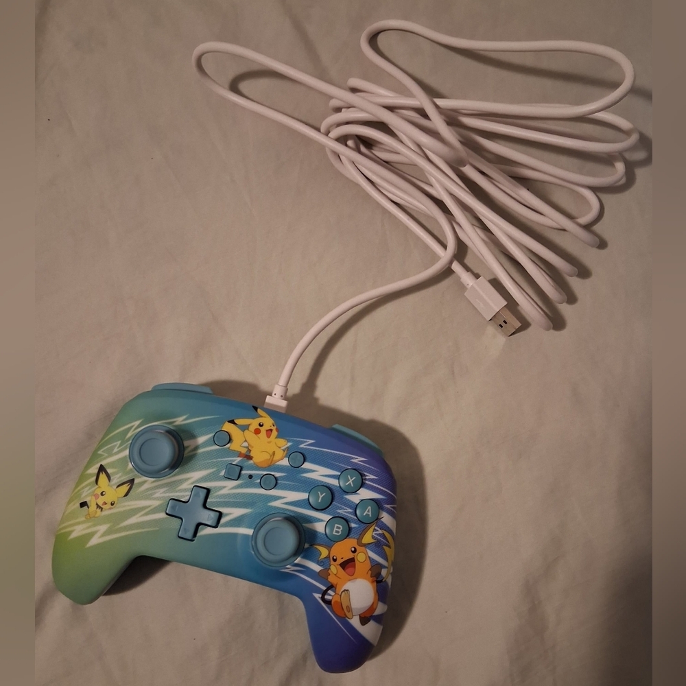 Nintendo Switch Wired Controller Pikachu Evolution.